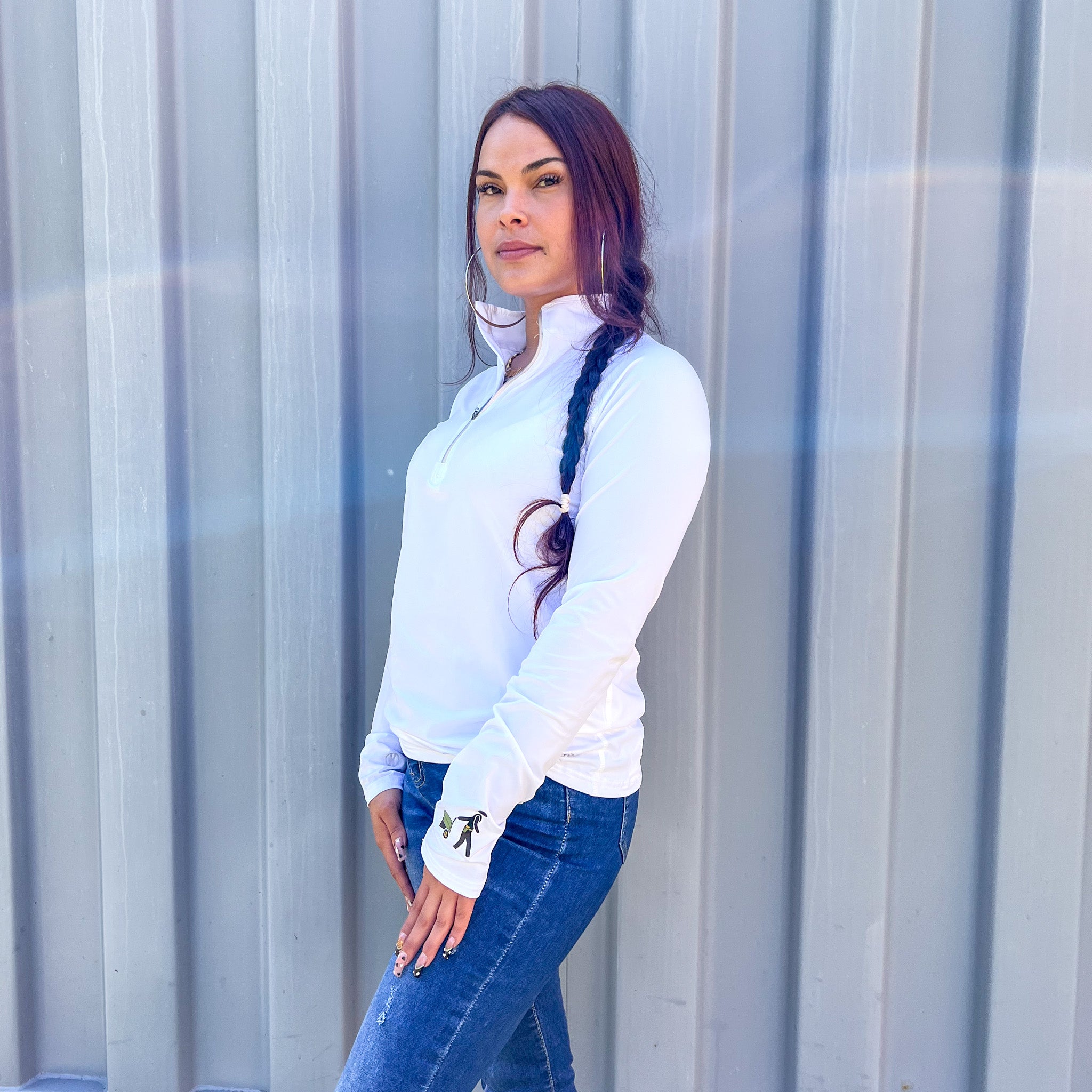 Women's 1/2 Zip Pullover in white displayed on model, front view