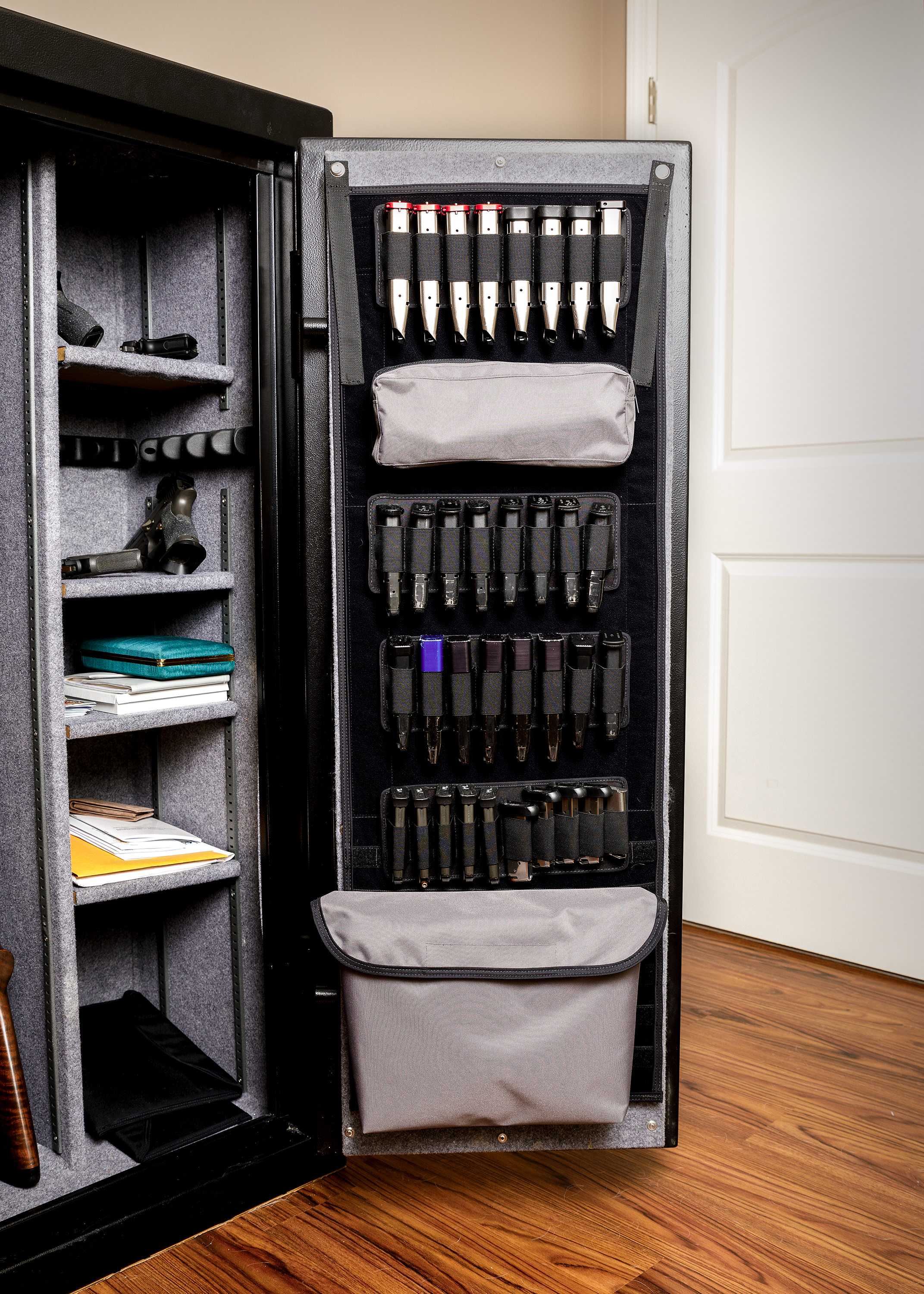 Gun safe door panel organizer shown inside gun safe