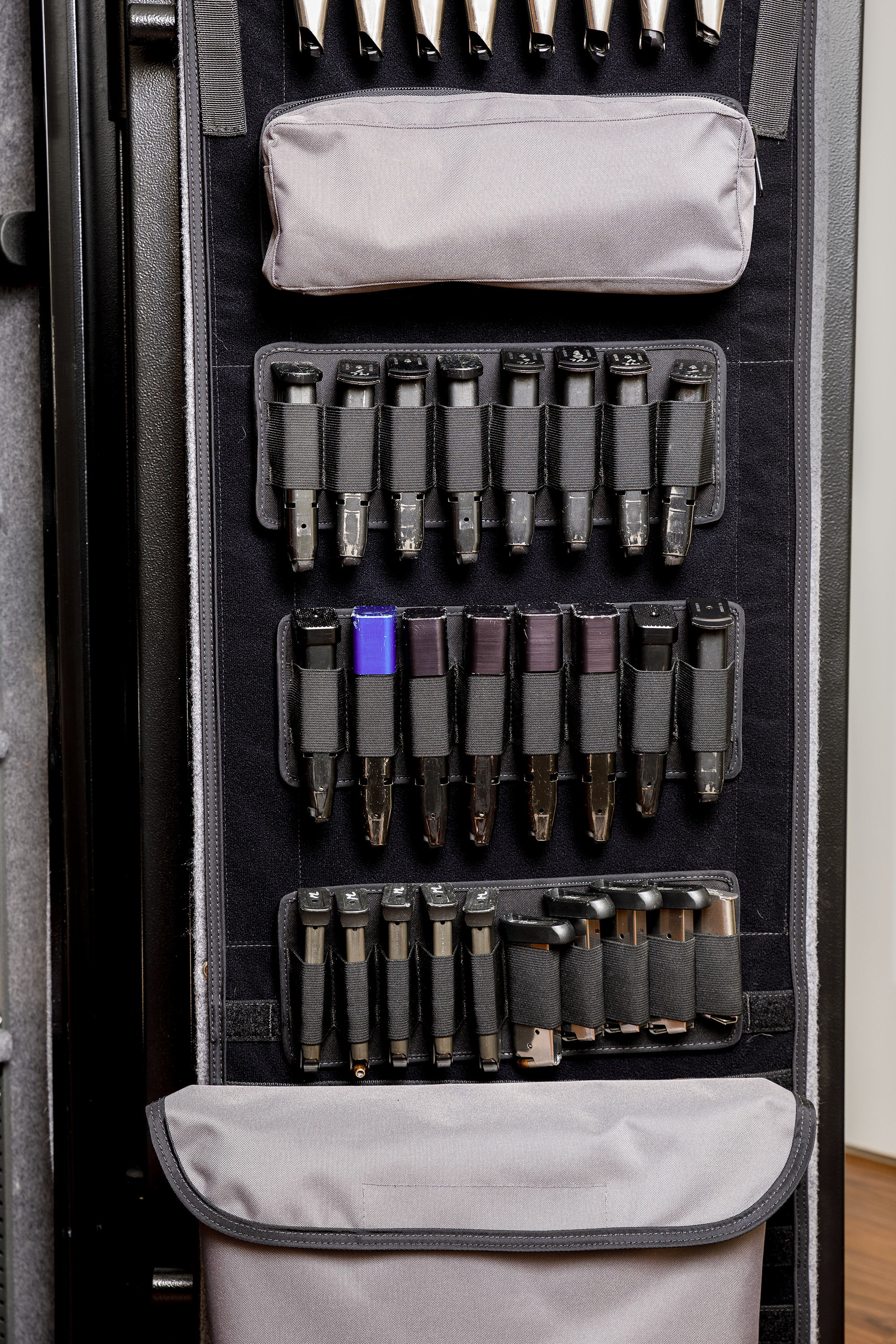 Close up of several gun safe door panel organizers