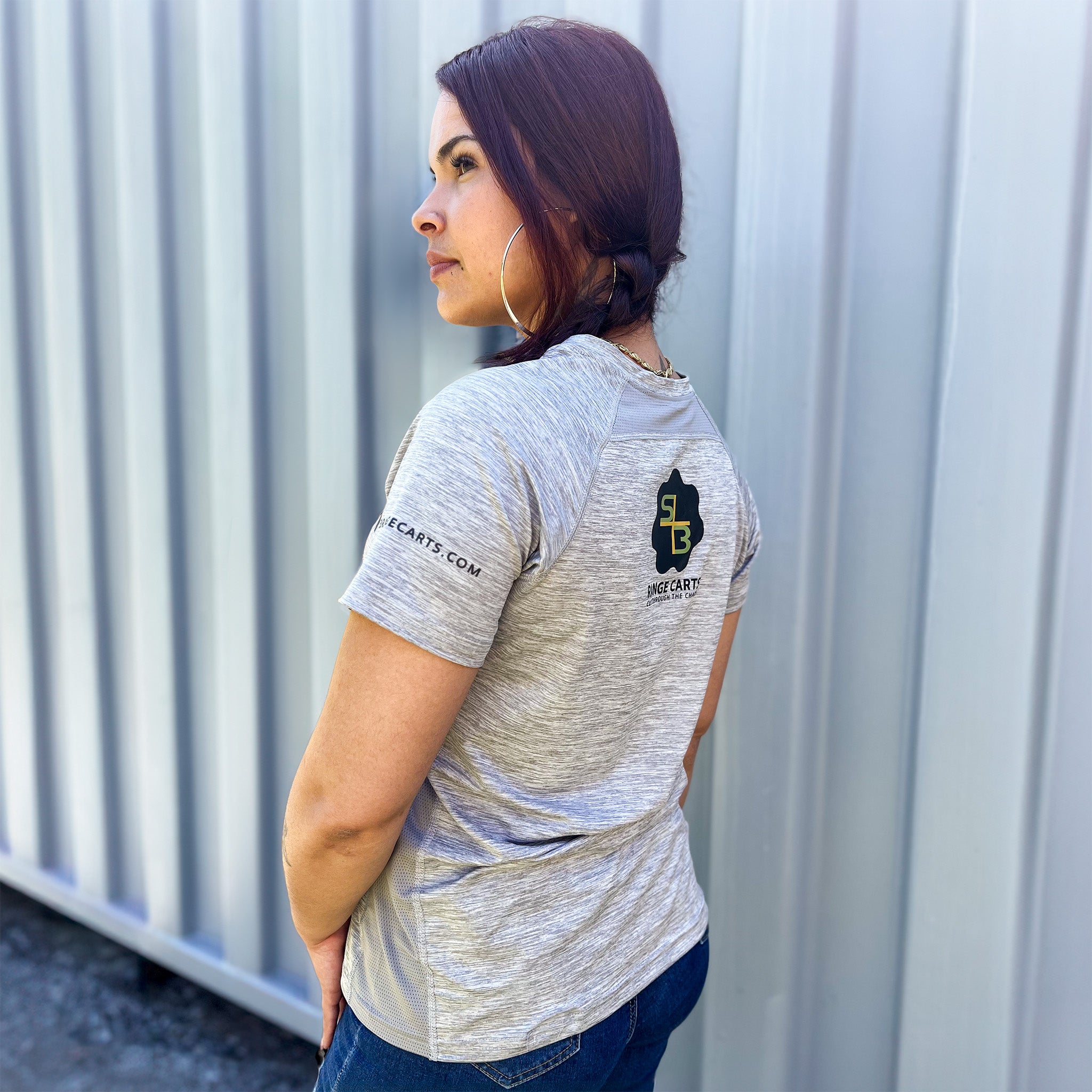 Women's S3 Performance Tee With Coolcore® gray displayed on model looking at backfront view